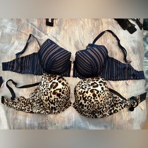 Two Victoria's Secret Navy and Leopard Print Bras